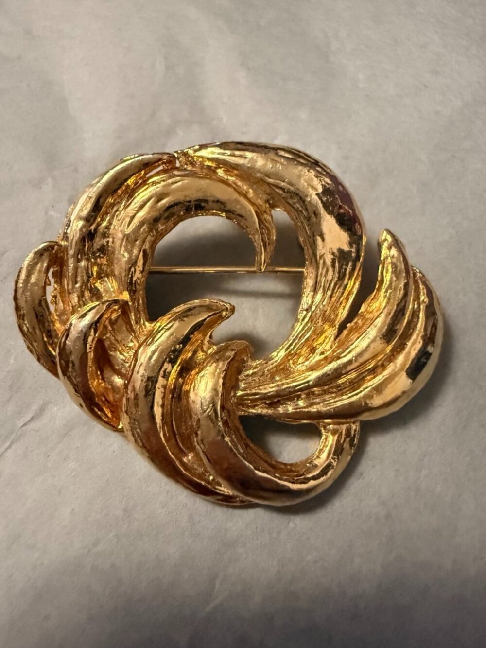 set of three unsigned brooches
